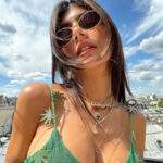 Mia Khalifa goes viral as she poses n*de behind a giant flower bouquet – See the pic here