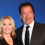 Arnold Schwarzenegger gives rare insight into private relationship with girlfriend of ten years, Heather Milligan