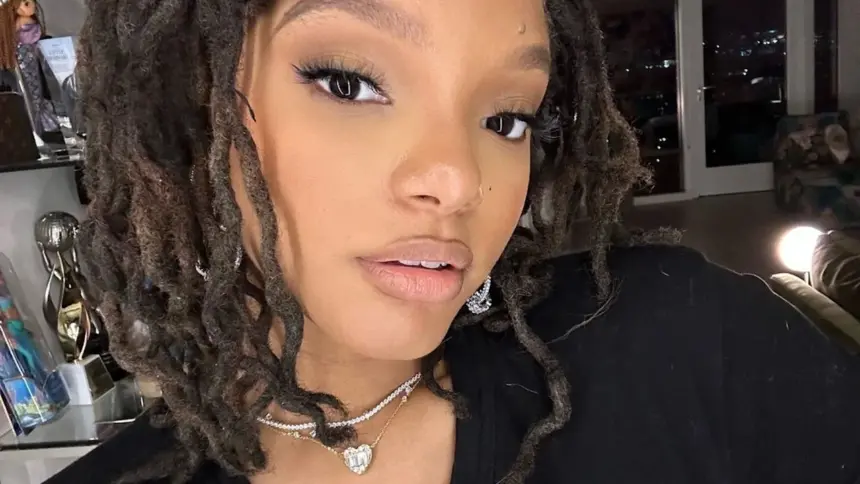 Halle Bailey showcases toned legs in latex boots in revealing new snap