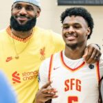 LeBron James watches his son Bronny James make his USC basketball debut after a cardiac arrest