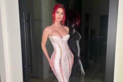 Megan Fox Beats Kardashians at Their Own Sexy Style Game in Naked Corset Dress at Annual Christmas Eve Bash