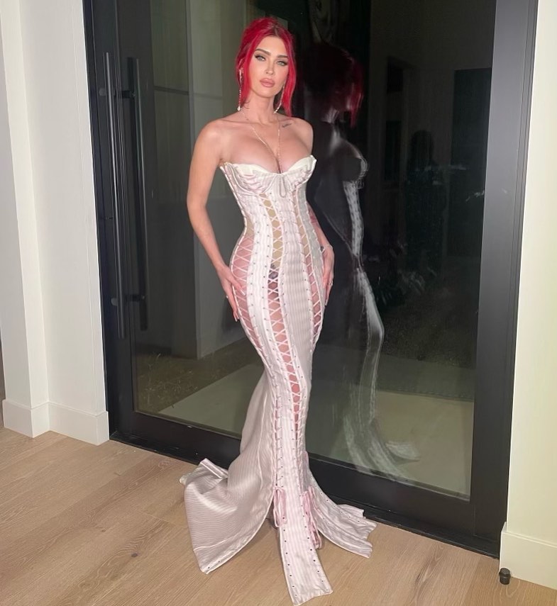 Megan Fox Beats Kardashians at Their Own Sexy Style Game in Naked Corset Dress at Annual Christmas Eve Bash