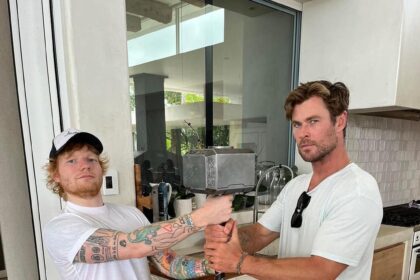 Ed Sheeran and Chris Hemsworth Pose with Thor’s Hammer Mjölnir in the Singer’s 2023 Recap