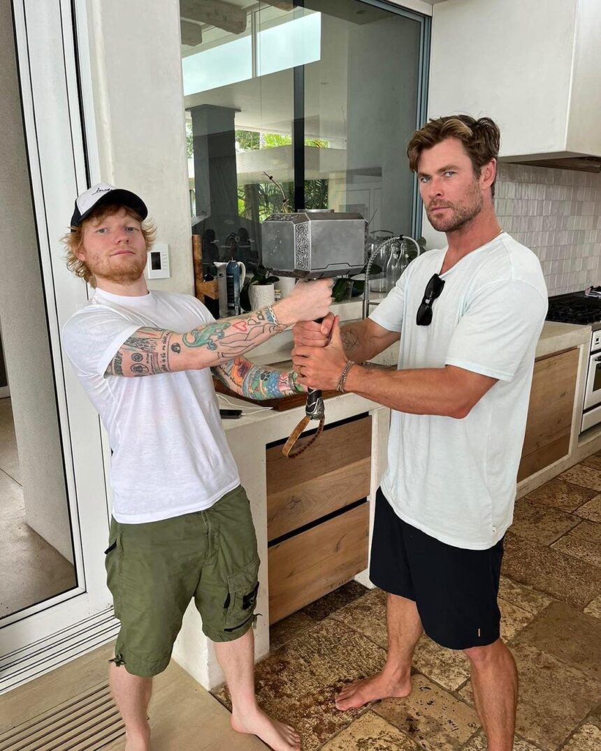 Ed Sheeran and Chris Hemsworth Pose with Thor’s Hammer Mjölnir in the Singer’s 2023 Recap