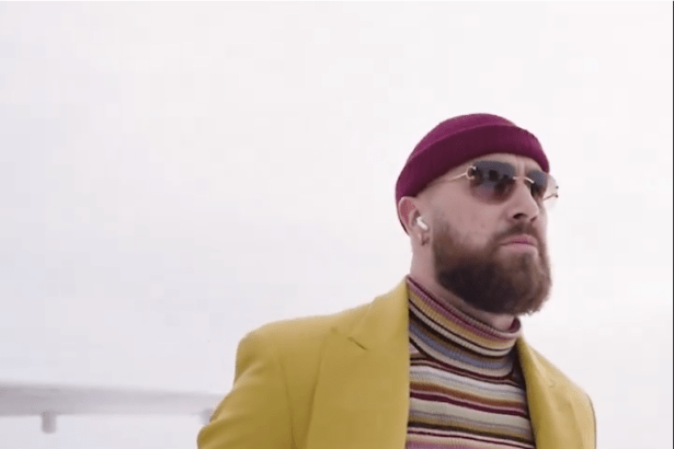 Travis Kelce’s Travel Suit and Striped Shirt Looks Suspiciously Similar to One of Taylor Swift’s ‘Anti-Hero’ Looks